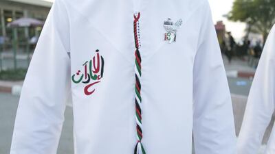 A young Emirati is creative with his custom-made kandura in RAK. Reem Mohammed / The National