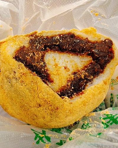 Sticky-rice cakes come with purple jam or red-bean paste. Visit Beijing Official / Instagram