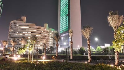 ADNOCs new building is illuminated with green lights to coincide with Abu Dhabi Sustainability Week. Courtesy General Secretariat of the Executive Council