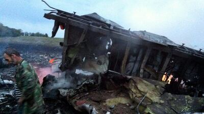 Ukraine’s Poroshenko expressed his ‘deepest and sincerest sympathies for the families and loved ones of those killed’ and vowed that ‘those behind this tragedy will be brought to justice’. Dominique Faget/AFP Photo