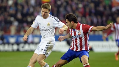 Real Madrid's midfielder Asier Illarramendi, left. AFP / February 11, 2014