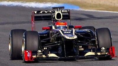Life in Al Ain: a man waters some of the flowers and plants he hopes to sell.
