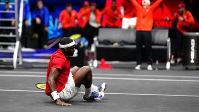 Frances Tiafoe celebrates winning against Stefanos Tsitsipas. PA