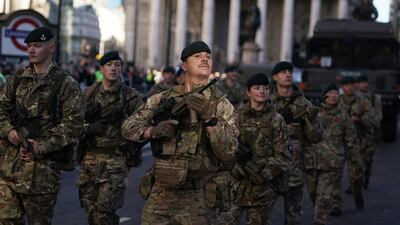 Military personnel take part in the Lord Mayor's Show. PA