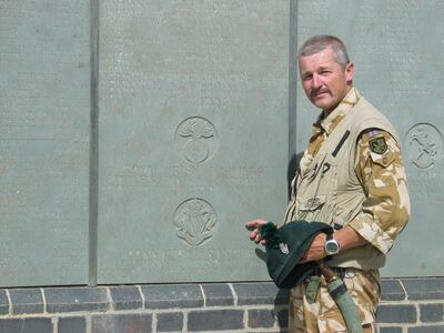 Colonel Tim Collins inspects the memorial at Al Amara in 2003. Getty Images