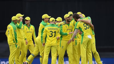 Kane Richardson of Australia, right, celebrates the dismissal of Sri Lanka captain Dimuth Karunaratne at the Oval on Sunday. Mike Hewitt / Getty Images