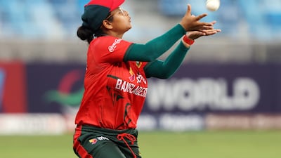 Bangladesh's Sobhana Mostary takes a catch as UAE's Theertha Satish loses her wicket in a spectcular batting collapse by the home side.