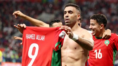 Abderrazak Hamdallah celebrates scoring Morocco's third goal. Reuters