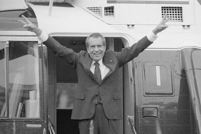 Richard Nixon says goodbye to the White House staff as he boards a helicopter after resigning as US President, August 9, 1974. AP