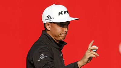 Rickie Fowler acknowledges fans after his birdie at 18 on Sunday to complete the third round in the lead at the Abu Dhabi HSBC Golf Championship. Paul Childs / Action Images / Reuters / January 24, 2016