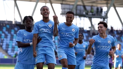 Manchester City's Oscar Bobb, second left, celebrates after scoring his side's second goal during a UEFA Youth League match against Leipzig at the Manchester City Academy Stadium on September 15, 2021. PA