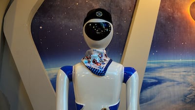 From the rubble of Iraq's war-ravaged Mosul arises the strange sight of androids gliding back and forth in a restaurant to serve their amused clientele.