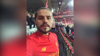 Liverpool fan Uke Krasniqi has not cut his hair since 2003. PA