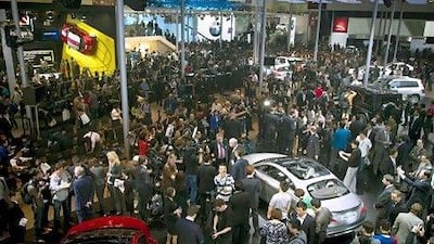 Brand awareness: visitors look at some of the 1,125 vehicles on display at the Beijing International Automotive Exhibition on Monday. Andy Wong / AP Photo