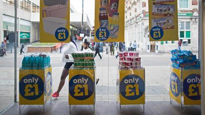 Pedestrians walk past a discount supermarket in the town of Luton offering products for £1. Sterling fell by more than 3% against the US dollar last week as fears that the country will exit the European Union without a meaningful trade agreement in place re-emerged. Bloomberg
