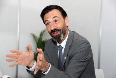 Fabrizio Carboni, regional director of the International Committee of the Red Cross, speaks on the sidelines of the Dubai International Humanitarian Aid and Development conference. Pawan Singh / The National