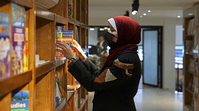 A Palestinian attends the reopening of the new Samir Mansour bookshop after it was destroyed during last year's 11-day war between Israel and the Palestinian Hamas movement, in Gaza City. Mansour's beloved bookshop has been rebuilt and restocked following an international fundraiser. All photos: AFP