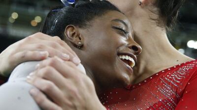 United States’ Simone Biles, left, and Aly Raisman embrace after winning gold and silver respectively for the women’s gymnastics individual all-around at the 2016 Rio Olympics at Rio Olympic Arena on August 11, 2016 in Rio de Janeiro, Brazil. Dmitri Lovetsky / AP Photo