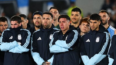 Argentina players gather to pay tribute to captain Lionel Messi, whose final game for the national team ended in a 3-0 win. Reuters