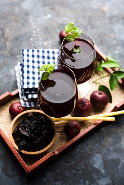 Kokum sherbet is made from the raw fruit of Garcinia indica and usually served with mint leaves. Getty Images