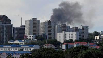 Black smoke rises over Kyiv. AFP