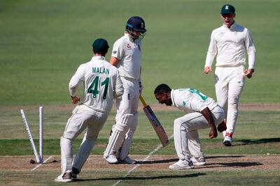 South Africa's Kagiso Rabada, second right, celebrates after dismissing England captain Joe Root. The celebration earned him a one match ban. AFP