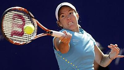 Justin Henin says the "fire burns again" little than a week after watching Belgian compatriot Kim Clijsters come out of retirement to win the US Open.