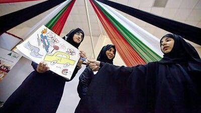 Bani Yas students showcase an advertising campaign as part of an entrepreneurship training session. Silvia Razgova / The National