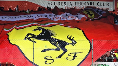 The Tifosi wave a Ferrari banner during qualifying in 2017. Getty