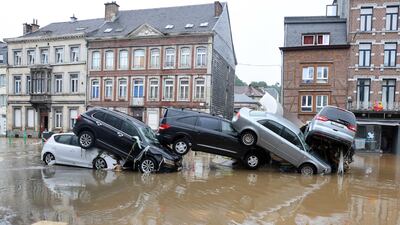 Cars piled up by the water at a roundabout in the Belgian city of Verviers, on July 15, after heavy rains and floods lashed western Europe, killing at least two people in Belgium. AFP