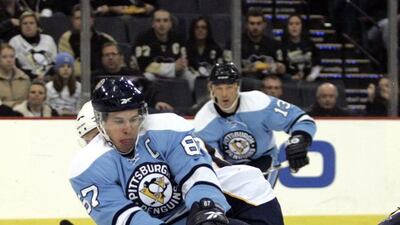6. Sidney Crosby, No 87, of the Pittsburgh Penguins handles the puck around the Nashville Predators in the first period at Mellon Arena in Pittsburgh. Justin K Aller / Getty Images / AFP