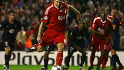 The Liverpool captain Steven Gerrard steps up to slot home a penalty to earn the Reds a point against Atletico Madrid.