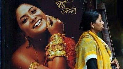 Gold is a popular investment in India compared with shares, mutual funds and property. Last year the amount of gold used in making jewellery rose 36 per cent to 685 tonnes. Dibyangshu Sarkar / AFP