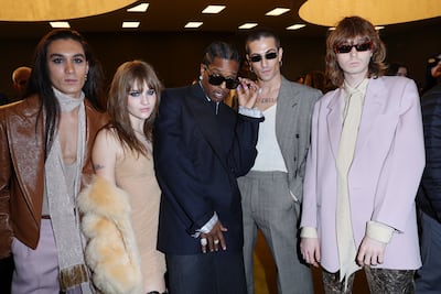 A$AP Rocky, centre, with the four-piece group Maneskin at Gucci's autumn/winter show in Milan. Getty Images
