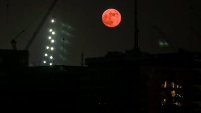 Al Raha Creek in Abu Dhabi is illuminated by the fourth and final supermoon of the year. All photos: Victor Besa / The National