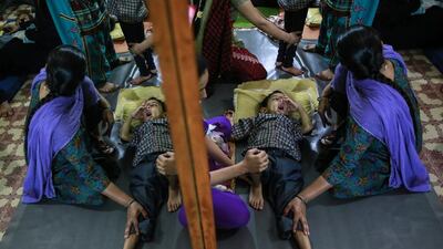 A boy receives treatment at a rehabilitation centre supported by Bhopal Medical Appeal for children who were born with mental and physical disabilities in Bhopal.