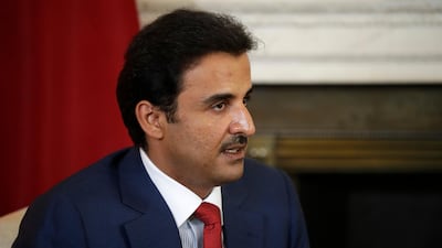 The Emir of Qatar Tamim bin Hamad Al Thani speaks with British Prime Minister Theresa May at the start of their meeting at 10 Downing Street in London on July 24, 2018. Matt Dunham / AP
