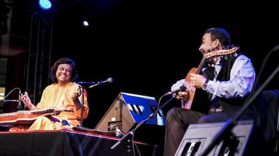 Hindustani slide guitar wizard Pandit Debashish Bhattacharya and Moroccan oud master Driss el Maloumi at NYUAD. Courtesy NYUAD