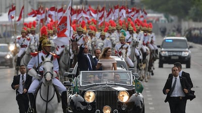 Lula's predecessor Jair Bolsonaro and his wife Michelle on their way to his inauguration in Brasilia in January 2019