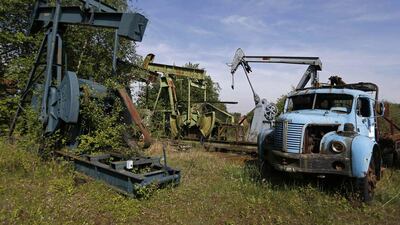 Abandoned oil pumps, part of the French Oil Museum collection, are seen near a rusted truck in a storage area of the museum in Merkwiller-Pechelbronn. Vincent Kessler / Reuters
