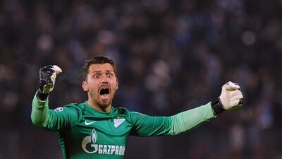 Zenit’s goalkeeper Yuri Lodygin reacts during the second-leg round of 16 Uefa Champions League football match FC Zenit vs SL Benfica at the Petrovsky stadium in St Petersburg on March 9, 2016. AFP PHOTO / OLGA MALTSEVA