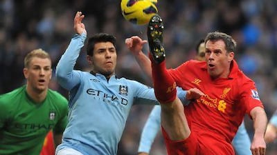 Liverpool defender Jamie Carragher, right, impressed our columnist against Manchester City at Etihad Stadium last week.