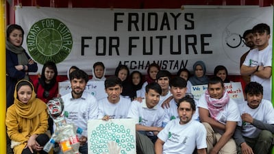Afghanistan's Fridays for Future chapter poses for a picture at their office in West Kabul. Stefanie Glinski for The National