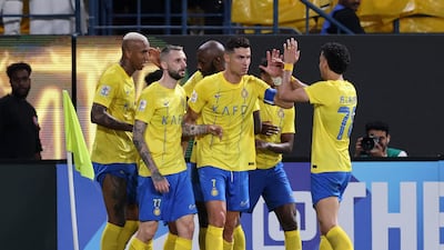 Al Nassr's Cristiano Ronaldo celebrates scoring their first goal against Istiklol. Reuters