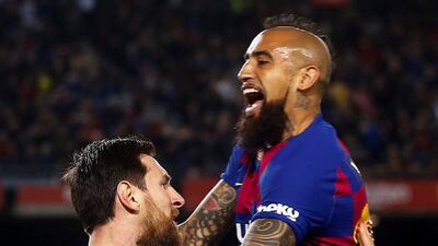 2. Barcelona - 4134 points. Lionel Messi celebrates with teammate Arturo Vidal . EPA