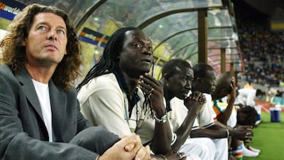 Manager Bruno Metsu on the bench at the 2002 World Cup with his Senegal side. Martin Rose / Bongarts / Getty Images / June 22, 2002
