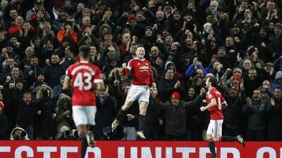 Wayne Rooney of Manchester United celebrates scoring their third goal against Stoke City on Tuesday night. Carl Recine / Action Images / Reuters