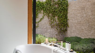 A master bathroom in one of the Amanzoe villas
