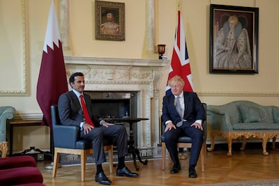 British prime minister at the time Boris Johnson with Emir of Qatar Sheikh Tamim at No 10 Downing Street in 2022. Getty Images