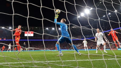 Wales midfielder Aaron Ramsey scores their first goal. EPA